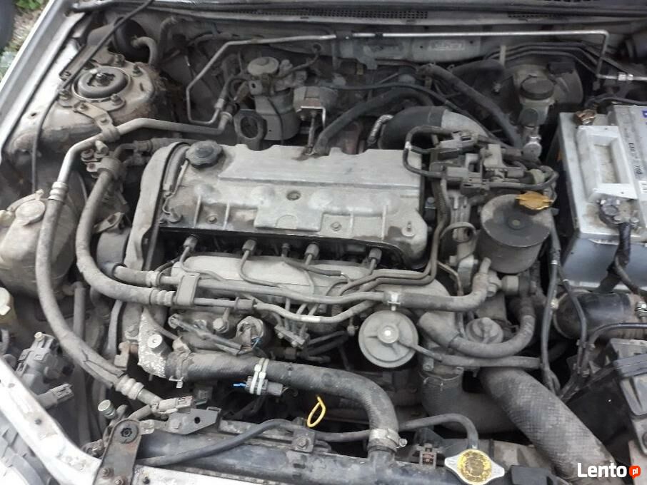 Archiwalne Mazda 323f 2001 r części wszystkie silnik szyba