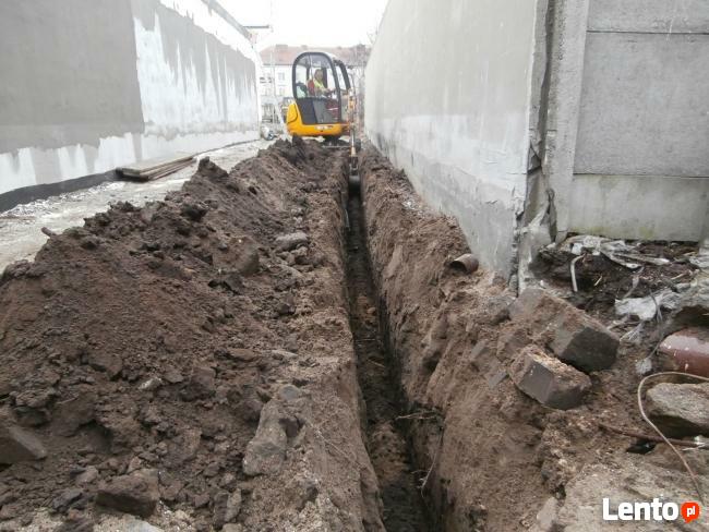 Minikoparka Bydgoszcz usługi minikoparką z młotem kucie