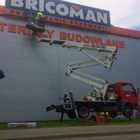 Montaż reklam, banerów na wysokości, zwyzka,podnośnik