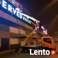 Montaż reklam, banerów na wysokości, zwyzka,podnośnik