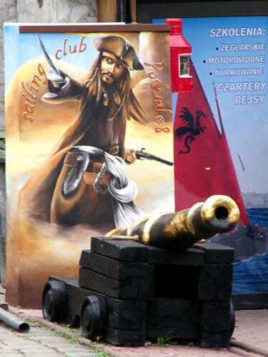 Mural malowany na ścianie, graffiti, reklama malowana