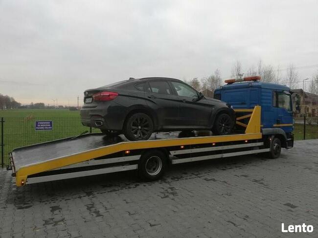 POMOC DROGOWA 24H OSOBOWE BUSY LAWETA HOLOWANIE