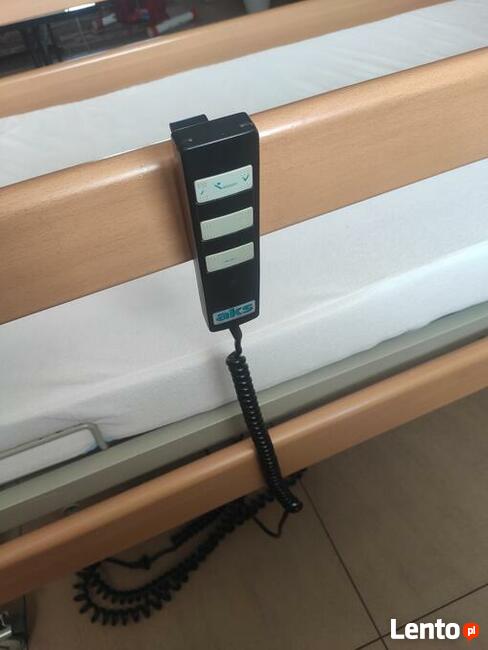 Łóżko rehabilitacyjne, sterowane pilotem + materac, wysięgni