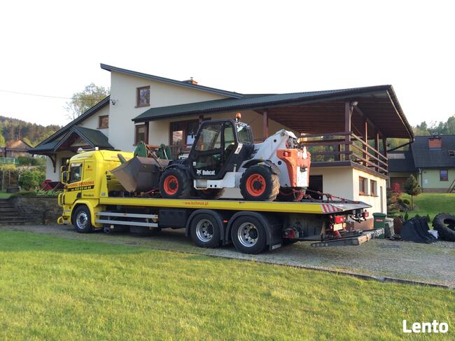 Pomoc drogowa Holownik Laweta osobowe ciężarowe autobusy TIR