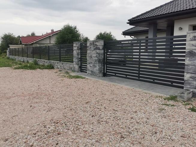 Bramy, balustrady, ogrodzenia, wiaty śmietnikowe, palisadowe