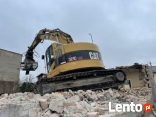 Transport niskopodwoziowy koparka szambo niwelacja piasek