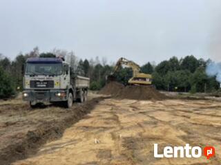 Transport niskopodwoziowy koparka szambo niwelacja piasek