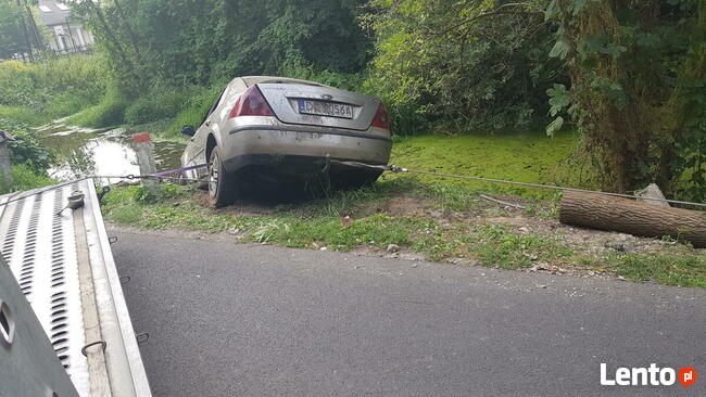 Holowanie z parkingu podziemnego Warszawa Pomoc Drogowa