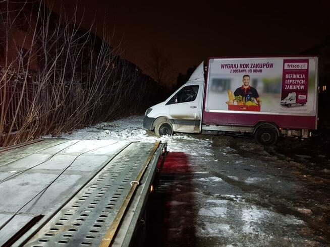 Holowanie z parkingu podziemnego Warszawa Pomoc Drogowa