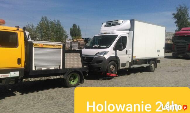 Holowanie z parkingu podziemnego Warszawa Pomoc Drogowa