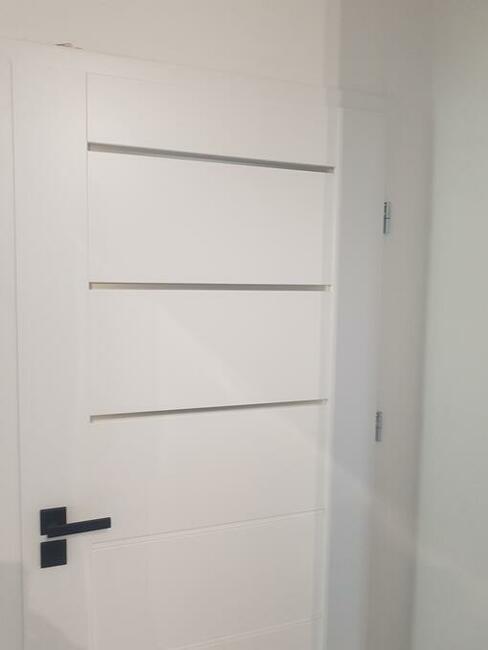 Montaż dopasowanie drzwi do starych ościeżnic Wroclaw.