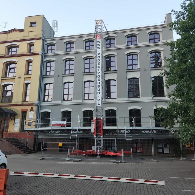 Wynajem podestów ruchomych masztowych podnośnika windy