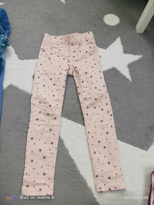 Jeans dla dziewczynki Reserved rożowe roz.122 nowe