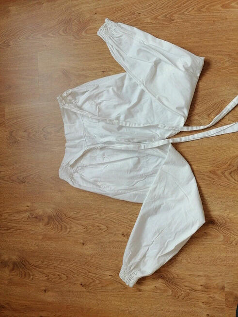 białe spodnie rozmiar L