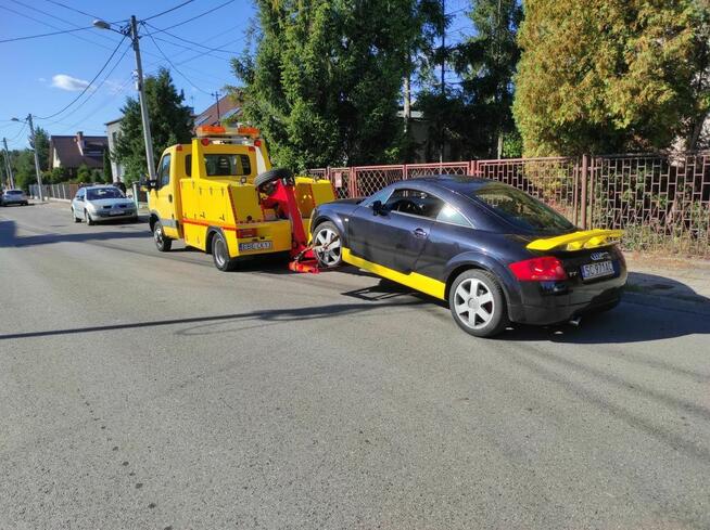 Pomoc drogowa holowanie laweta autolaweta transport 24h