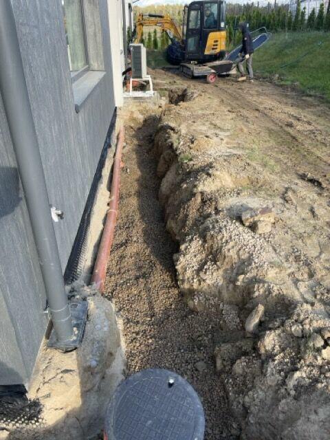 drenaże działek domów montaż zbiorników na wodę deszczową