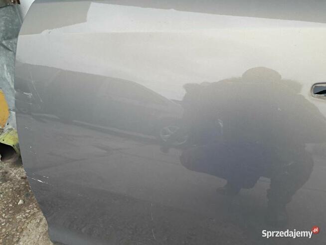 Opel Corsa D drzwi lewe przód, tył. z40w
