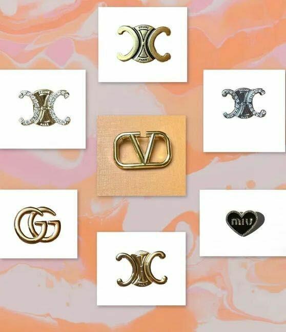 Broszka Yves Saint Laurent YSL złota