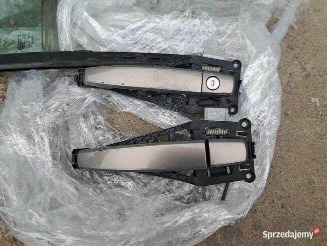 Opel Corsa D drzwi lewe przód, tył. z40w