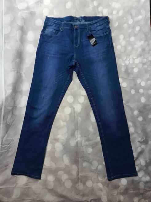 Nowe z metką spodnie niebieskie bawełniane dżinsowe
