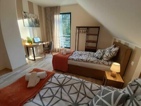 Apartamenty nad jeziorem W Sosnowym Lesie Pluski