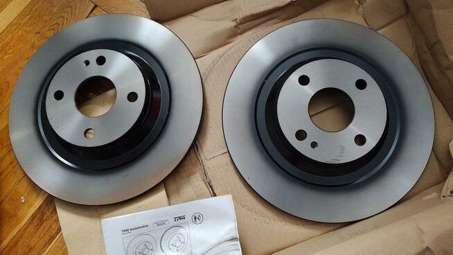Tarcze hamulcowe DF4406 TRW 2 szt. MAZDA TYŁ