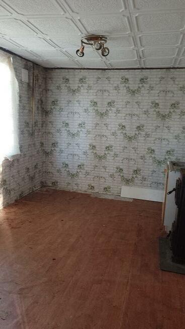 Działka z domem na sprzedaż