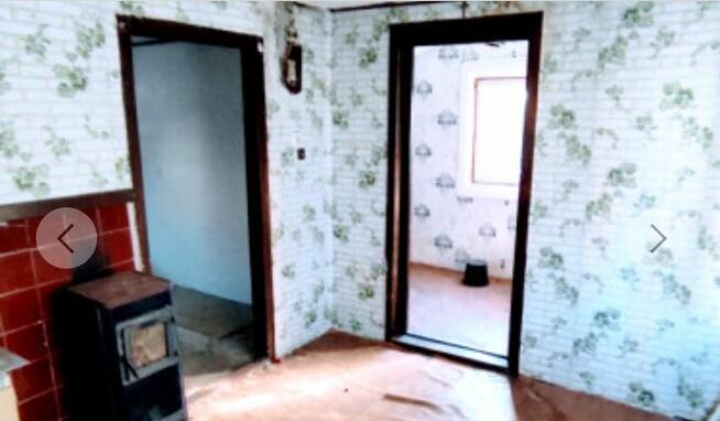 Działka z domem na sprzedaż