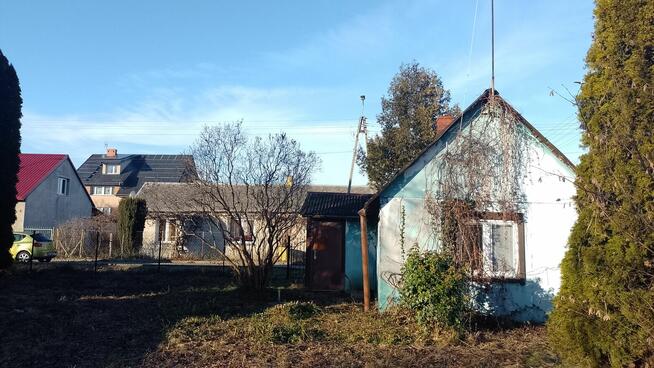 Działka z domem na sprzedaż