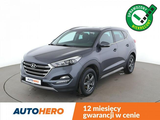 Hyundai Tucson navi klima auto grzane fotele kamera i czujniki parkowania