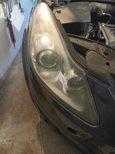 Lampa prawa soczewka Opel Corsa d