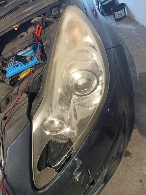 Lampa prawa soczewka Opel Corsa d