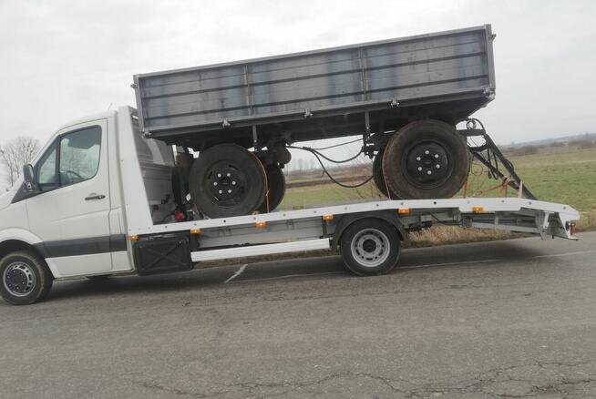 Pomoc drogowa holowanie laweta transport