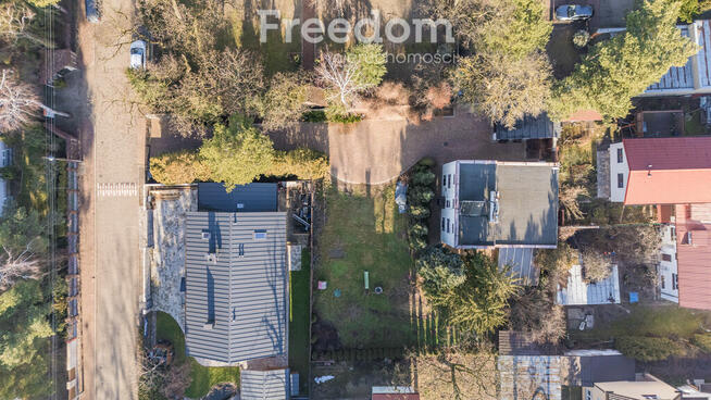 Przestrzeń dla Dwóch Rodzin w Idealnym Otoczeniu