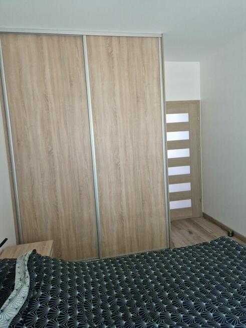 Nowe mieszkanie - taras, ogród, miejsca postojowe