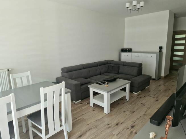 Nowe mieszkanie - taras, ogród, miejsca postojowe