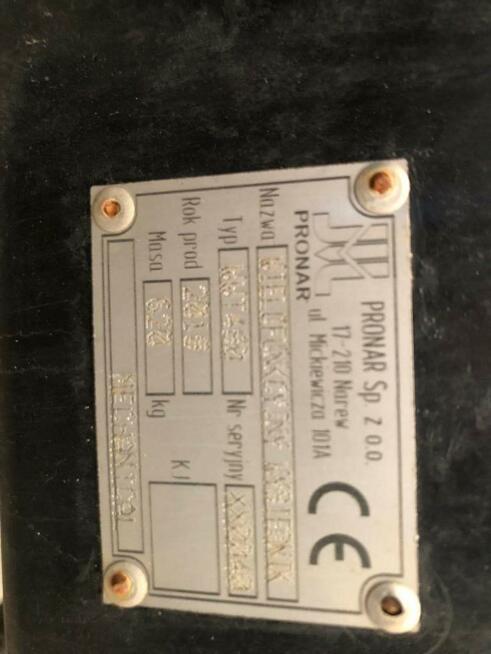 Wysięgnik wielofunkcyjny Pronar WWT480 z głowicą koszącą.