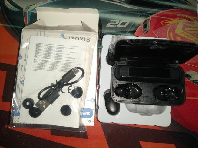 Słuchawki bezprzewodowe z powerbankiem, Izoxis, nowe, 20 zł.