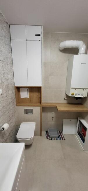 MEBLE NA WYMIAR-kuchnie ,szafy ,łazienkowe i nietypowe