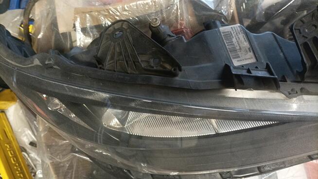 Renault Laguna II przednie reflektory - stan idealny