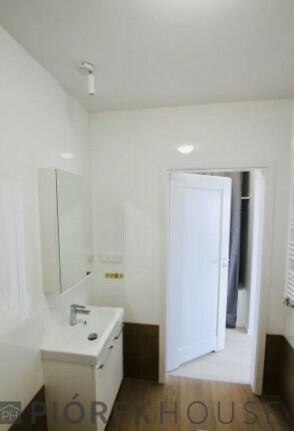 Dwupoziomowe mieszkanie na Wawrze