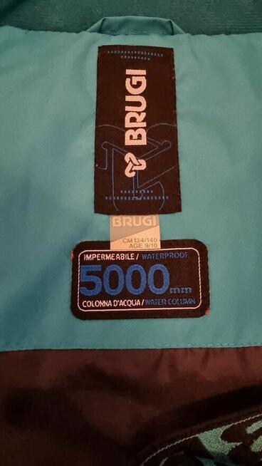 Strój, kombinezon narciarski.