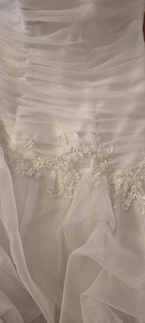 Sprzedam suknie Ślubną rozmiar 38-40