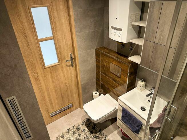 Nowoczesna kawalerka Tysiąclecie | Zmywarka, TV 55”, Balkon!