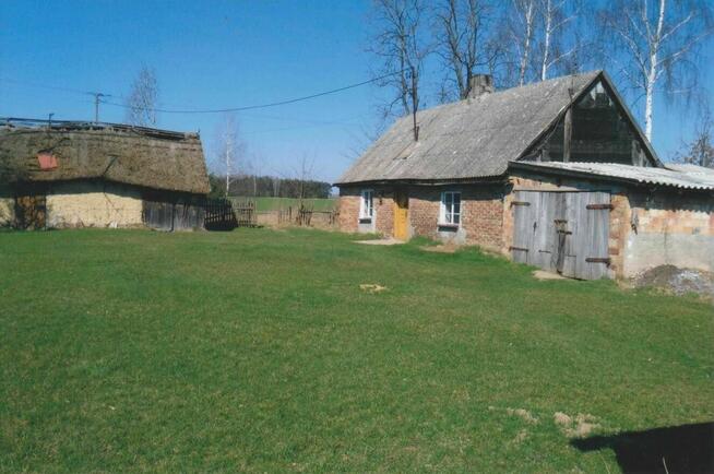 Sprzedam lub zamienię działkę z budynkami na mieszkanie.