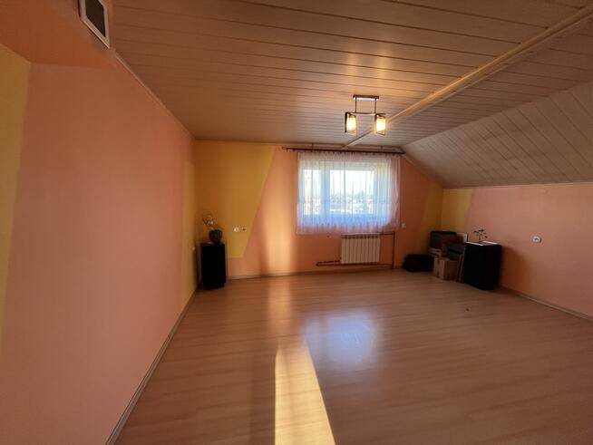 Dom wolnostojący z częścią handlową w Dęblinie.