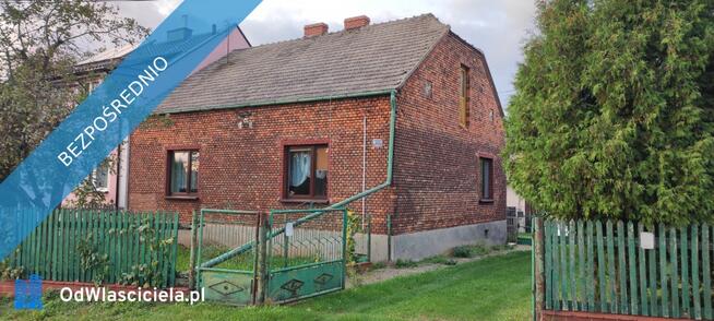 Dom z cegły z dużą działką + budynki gospodarcze