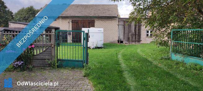 Dom z cegły z dużą działką + budynki gospodarcze