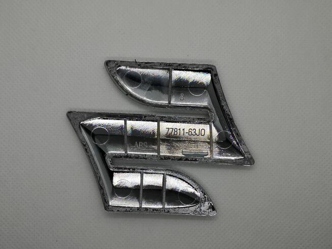 Emblemat znaczek logo Suzuki Vitara Swift Splash 77811-63J0