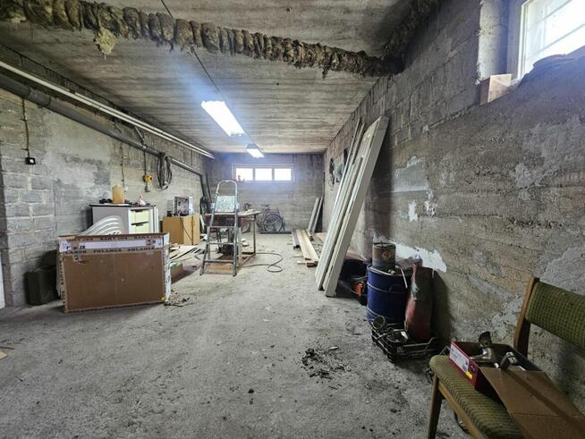 Budynek gospodarczy z garażem i warsztatem